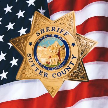 Sheriff Badge Over US Flag