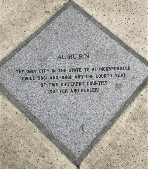 Auburn sidewalk marker